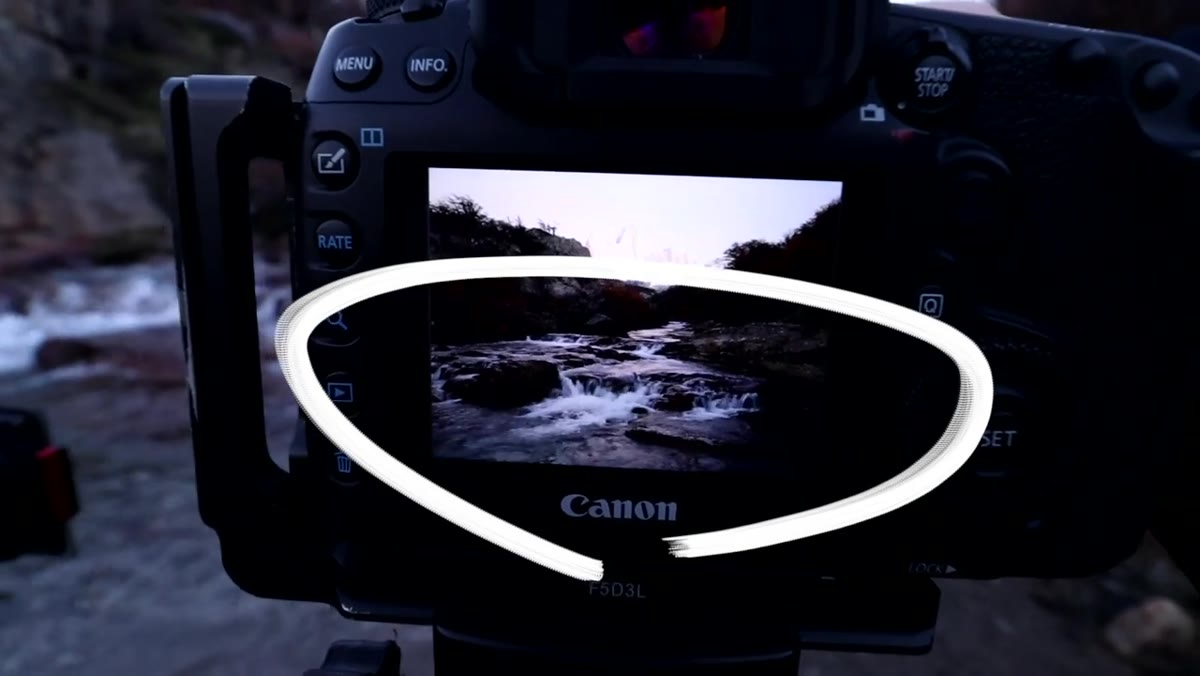 Close view of polarizer on lens beside the waterfall