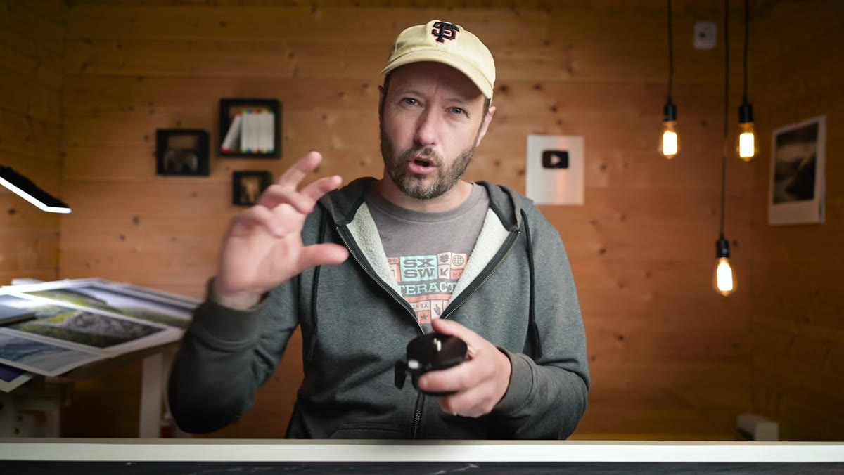 Camera settings overview, tripod with leveling head visible