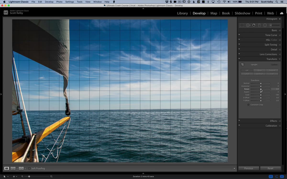 Transform panel with rotate slider being adjusted, grid overlay visible