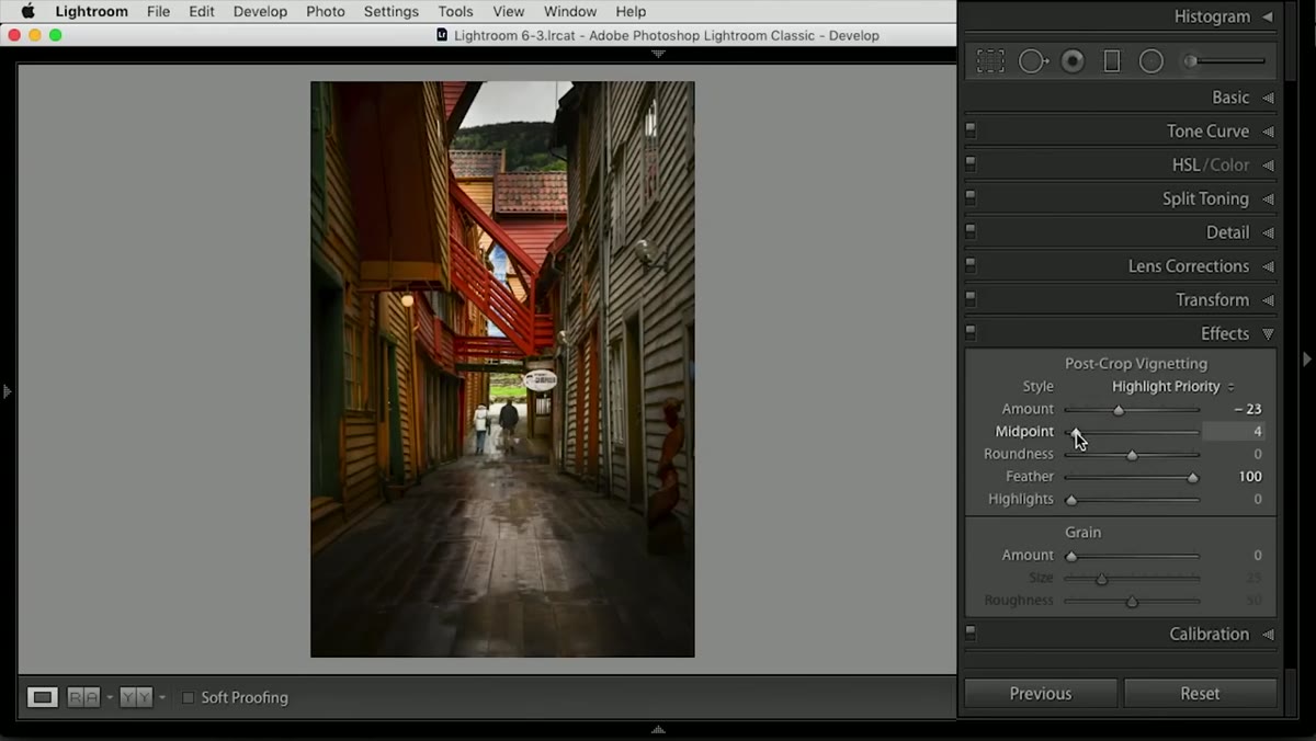 Dark brush strokes painted around frame edges to create tunnel effect
